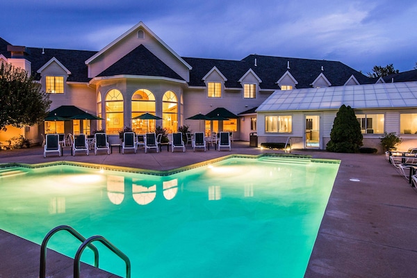 Indoor pool, seasonal outdoor pool, pool umbrellas, sun loungers