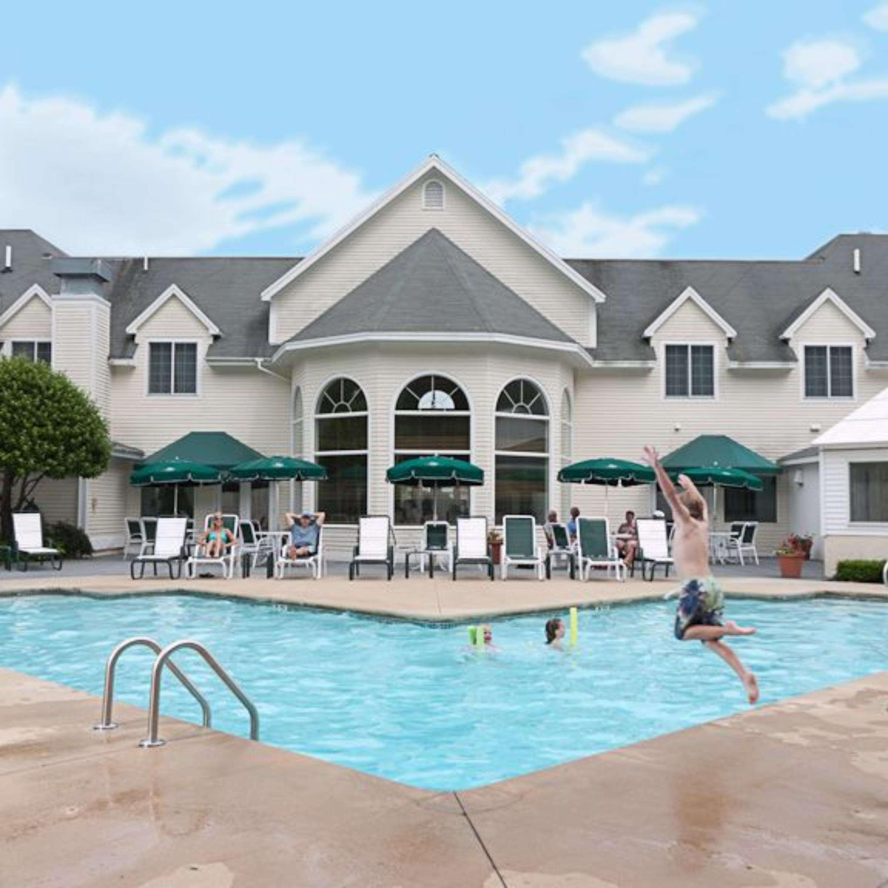 indoor pool, seasonal outdoor pool, pool umbrellas, pool loungers