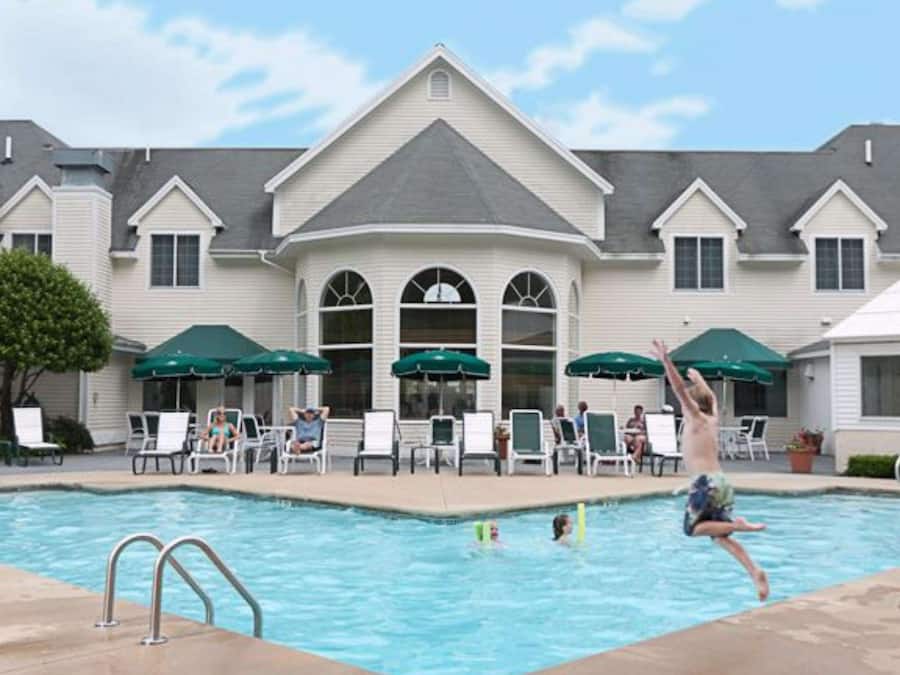 Indoor pool, seasonal outdoor pool, pool umbrellas, pool loungers