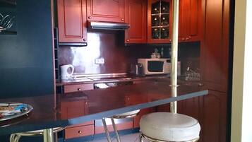 Business Apartment, 1 Bedroom, Non Smoking, City View | Private kitchen | Coffee/tea maker, electric kettle