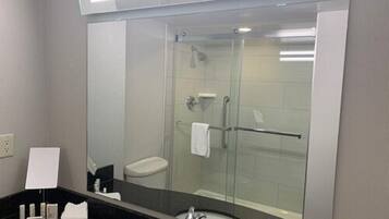 Designer toiletries, hair dryer, towels, soap