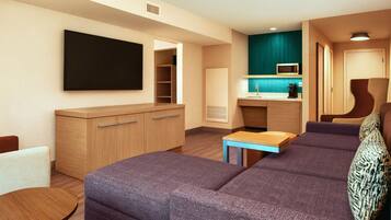 Suite, 1 King Bed | Living area | TV