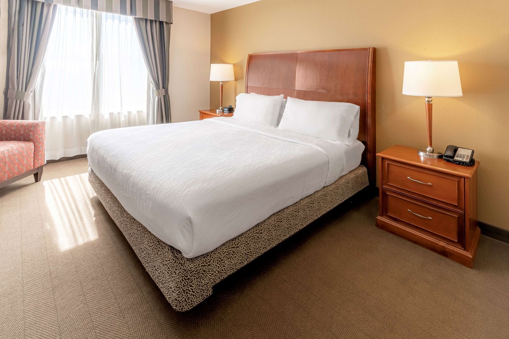 Hypo-allergenic bedding, in-room safe, desk, laptop workspace