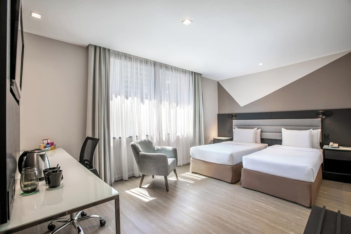 Deluxe Twin Room (3 Ad) | 1 bedroom, minibar, in-room safe, blackout curtains