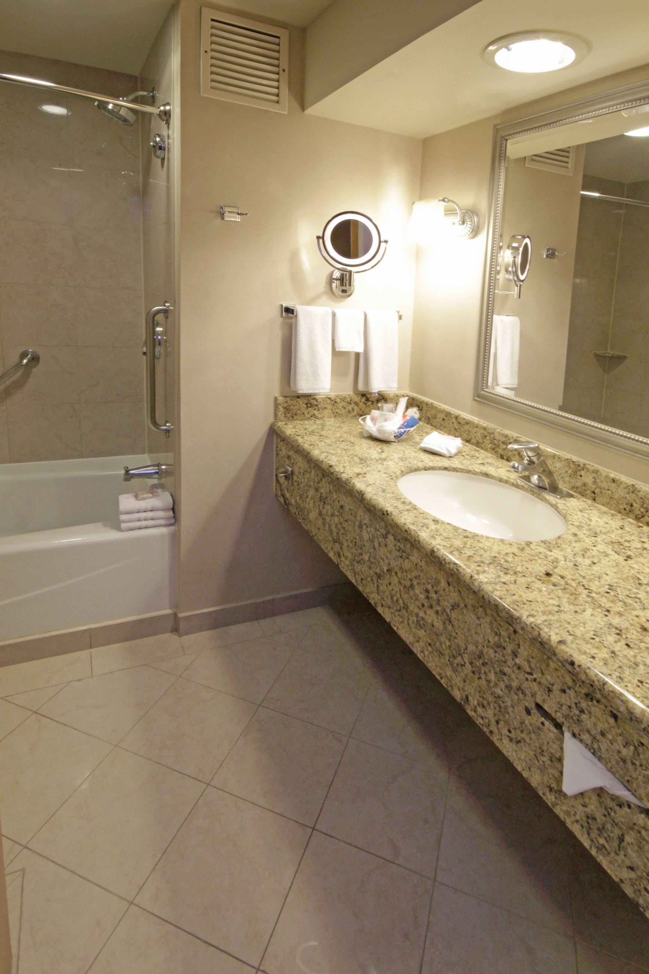 combined shower/bathtub, deep-soaking bathtub, free toiletries