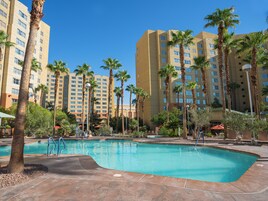 5 outdoor pools, open 8:00 AM to 10:00 PM, pool umbrellas, sun loungers