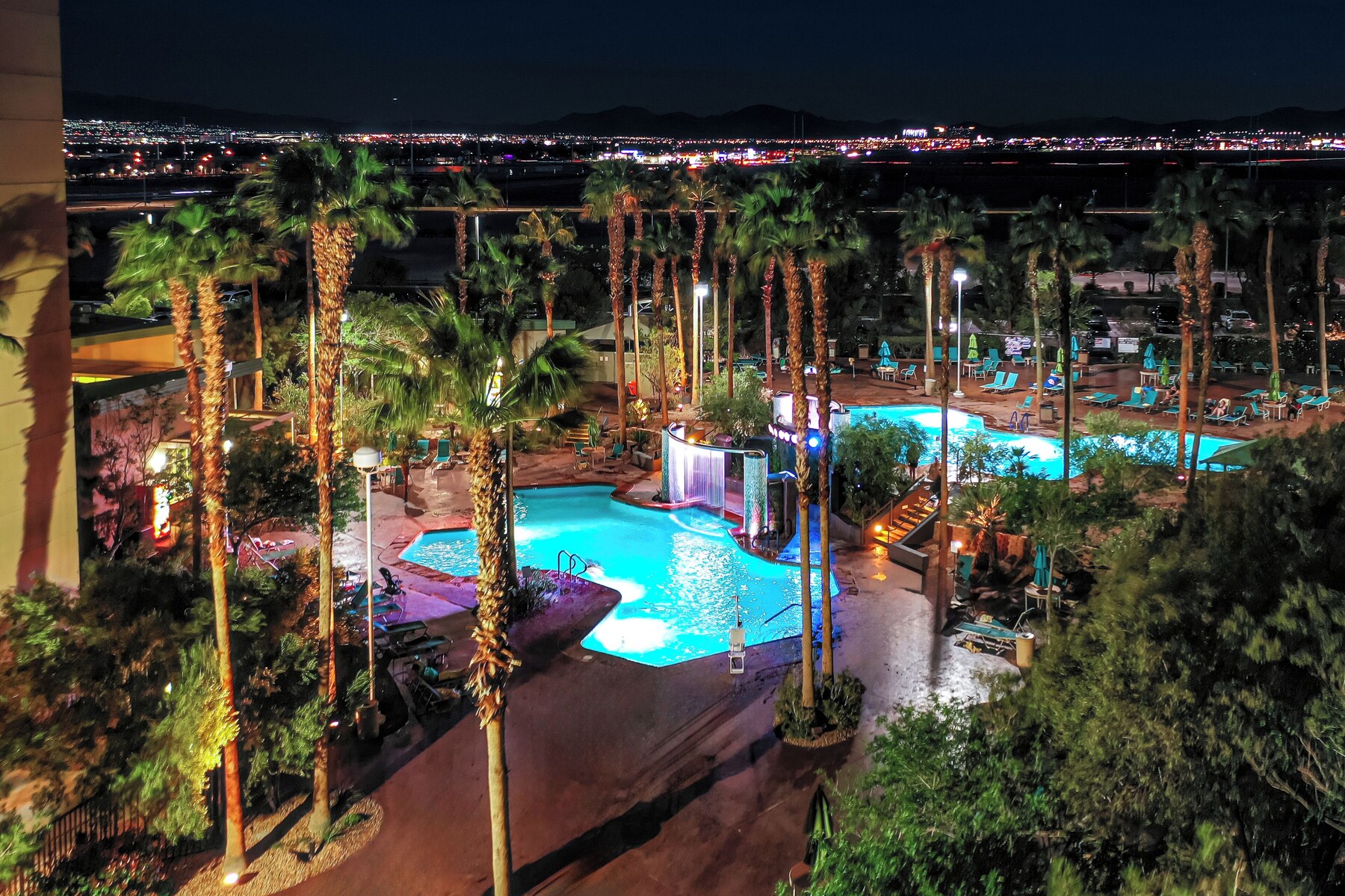 5 outdoor pools, open 8:00 AM to 10:00 PM, pool umbrellas, sun loungers