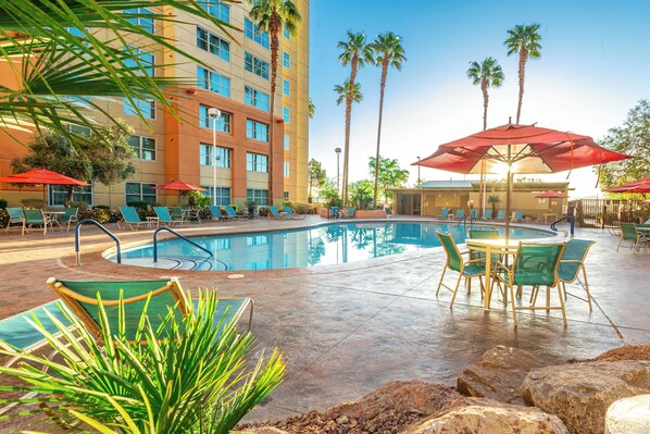 5 outdoor pools, open 8:00 AM to 10:00 PM, pool umbrellas, pool loungers