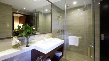 Combined shower/bathtub, rainfall showerhead, hair dryer, bathrobes