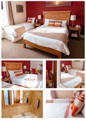 A hotel room with two beds, a wooden headboard, a bedside table with a lamp, a telephone, and a mirror. - Pymgate Lodge Hotel (Cheadle)