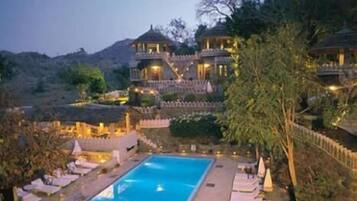 Outdoor pool, open 7:00 AM to 6 PM, pool umbrellas, pool loungers