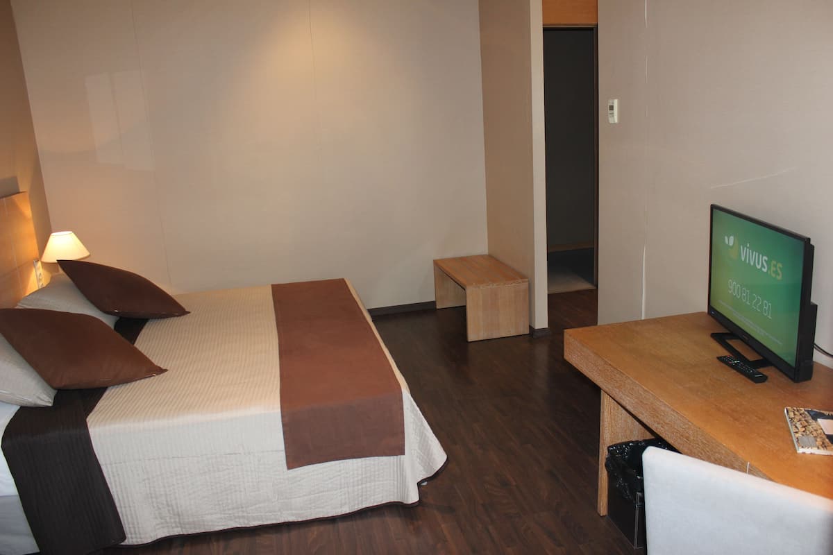 Ropa de cama de alta calidad y minibar