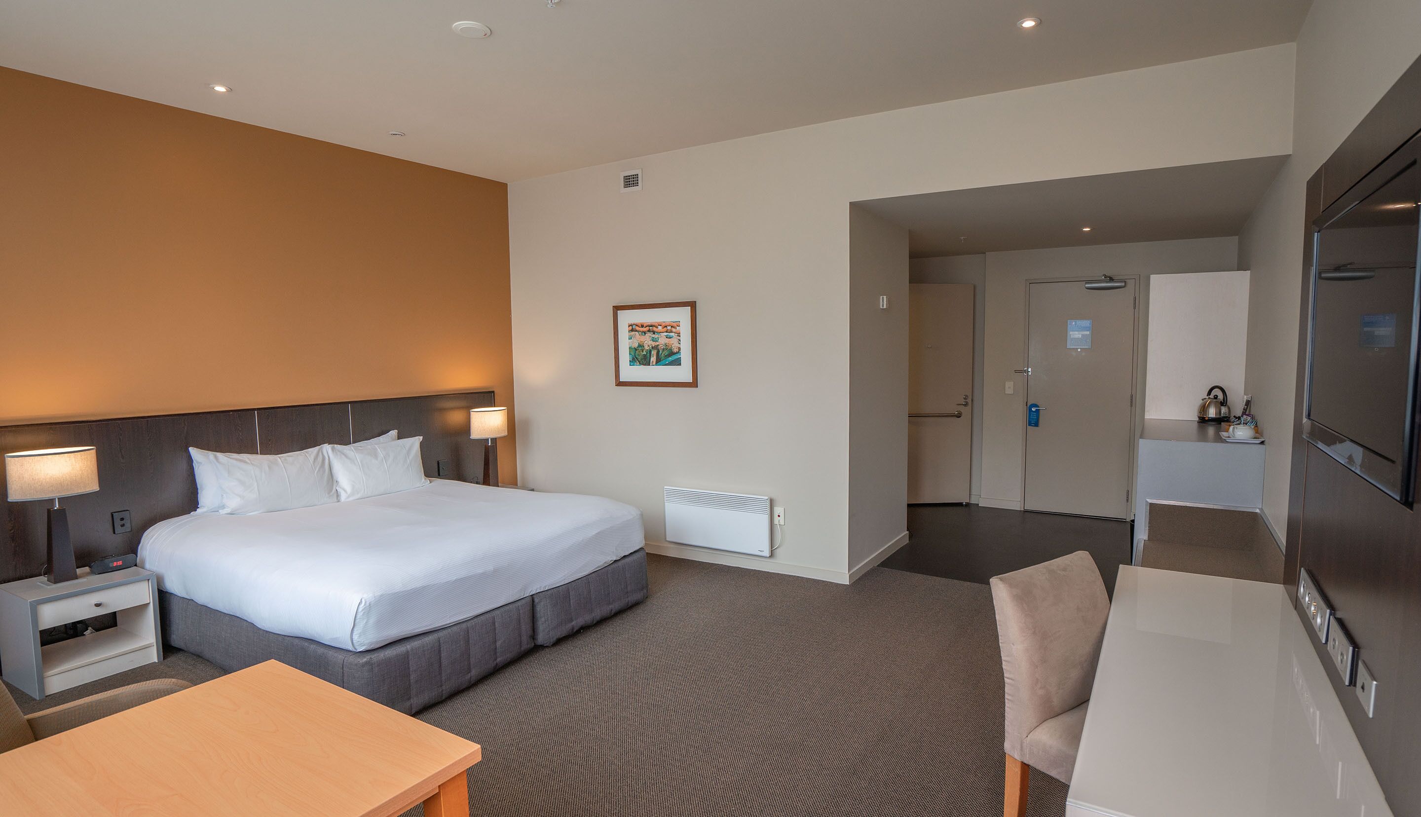 superior room, 1 king bed | premium bedding, in-room safe, desk, iron/ironing board