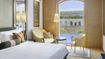 Suite Exécutive | Literie de qualité supérieure, minibar, coffres-forts dans les chambres