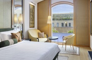 Executive Suite | Premium bedding, minibar, in-room safe, individually decorated