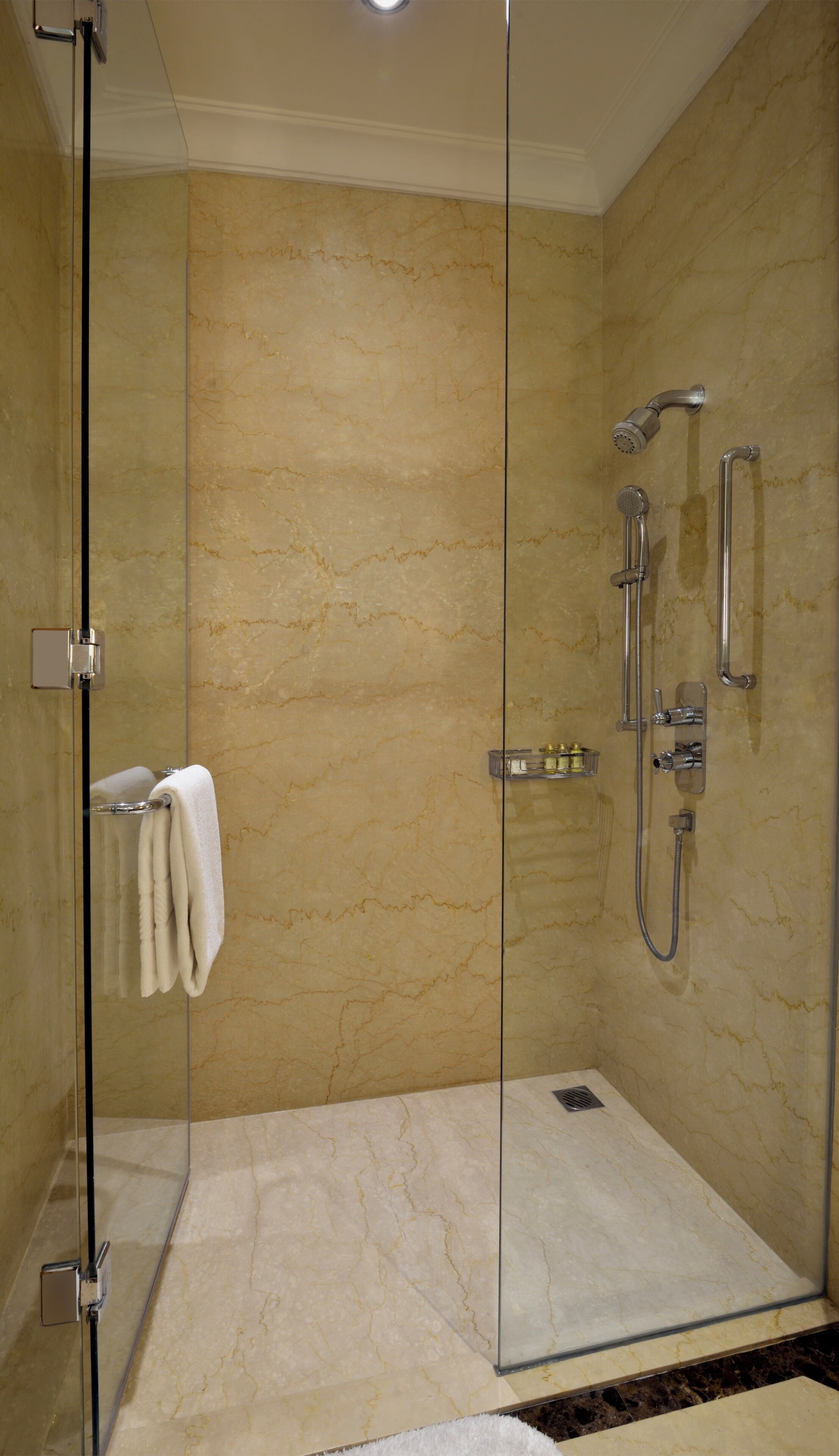 designer toiletries, hair dryer, bathrobes, slippers