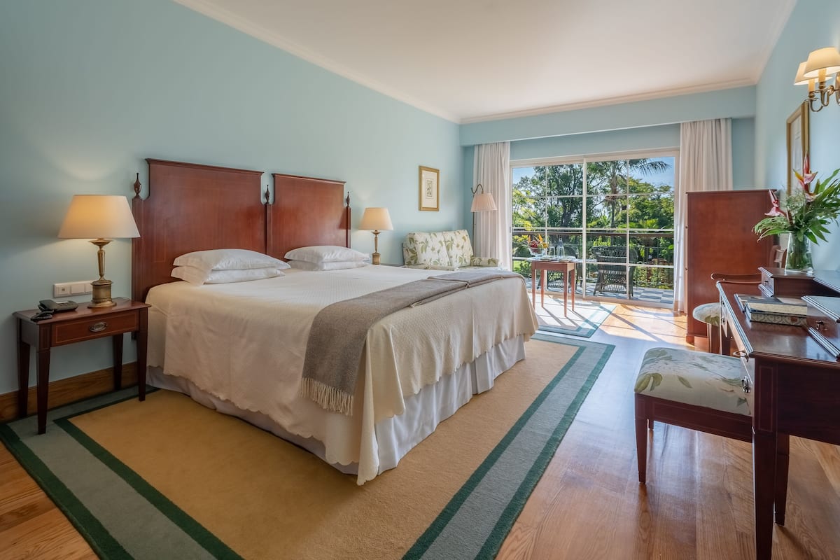 premium garden room | hypo-allergenic bedding, minibar, in-room safe, individually decorated