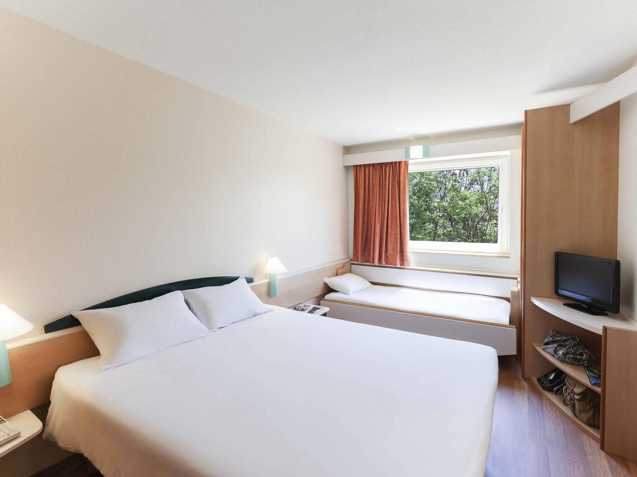 Room, Multiple Beds | In-room safe, desk, soundproofing, iron/ironing board