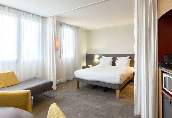 Premium bedding, free minibar, in-room safe, desk