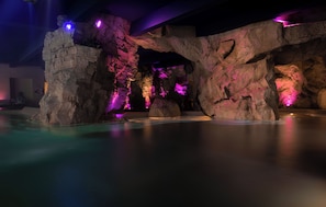 A rock formation with a pool in front. - Regina Palace Hotel (Stresa)
