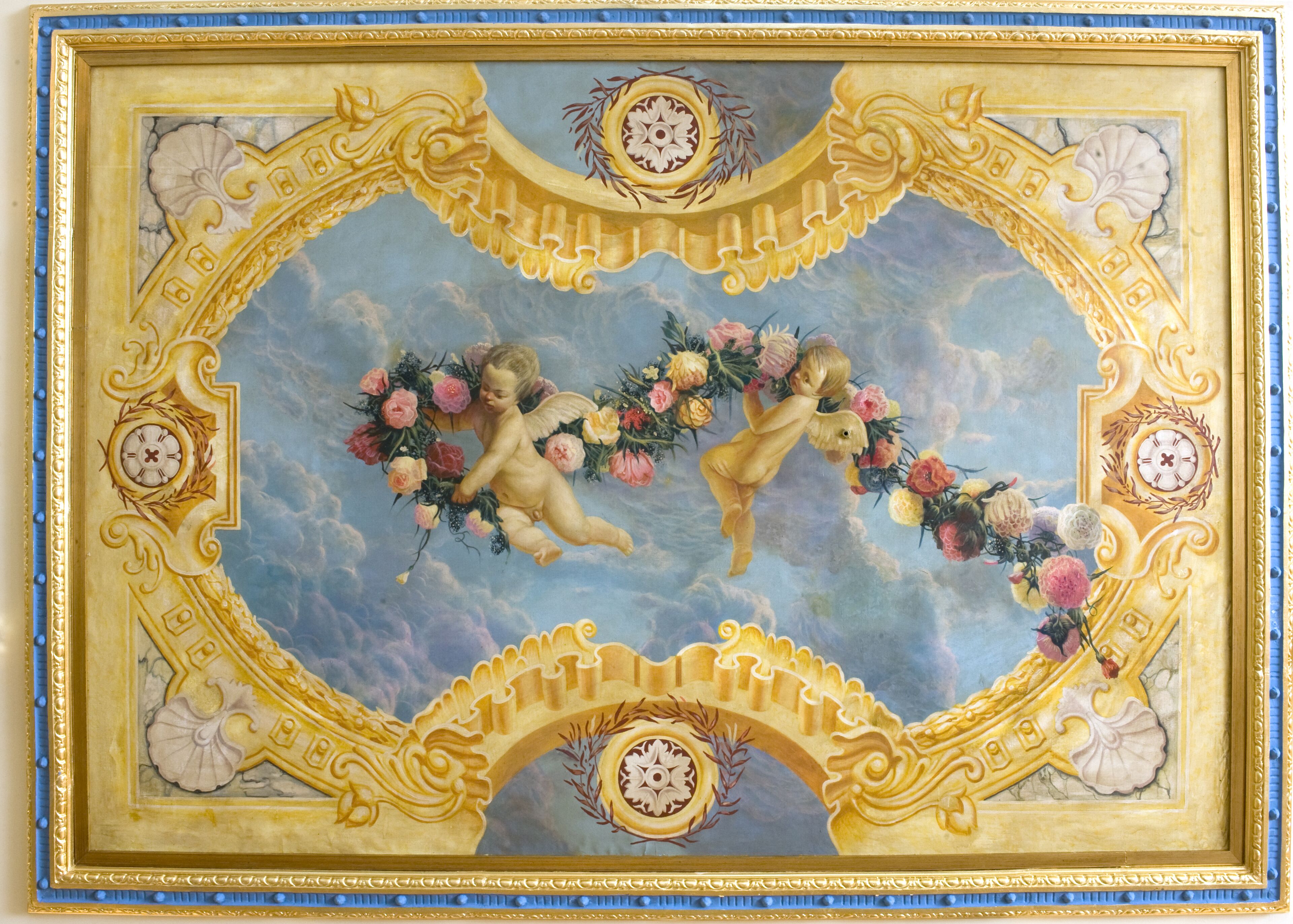 A ceiling fresco with cherubs holding floral garlands, ornate gold detailing, and a clock.