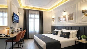 Premium bedding, free minibar, in-room safe, desk
