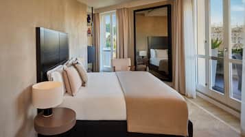 Suite, balcón | Ropa de cama de alta calidad, camas con pillow-top y minibar