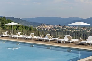 Outdoor pool, pool umbrellas, pool loungers
