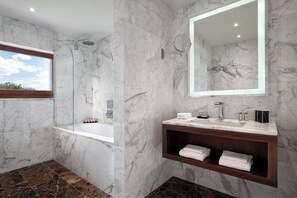 Designer toiletries, hair dryer, bidet, towels