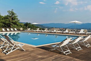 Outdoor pool, pool umbrellas, pool loungers