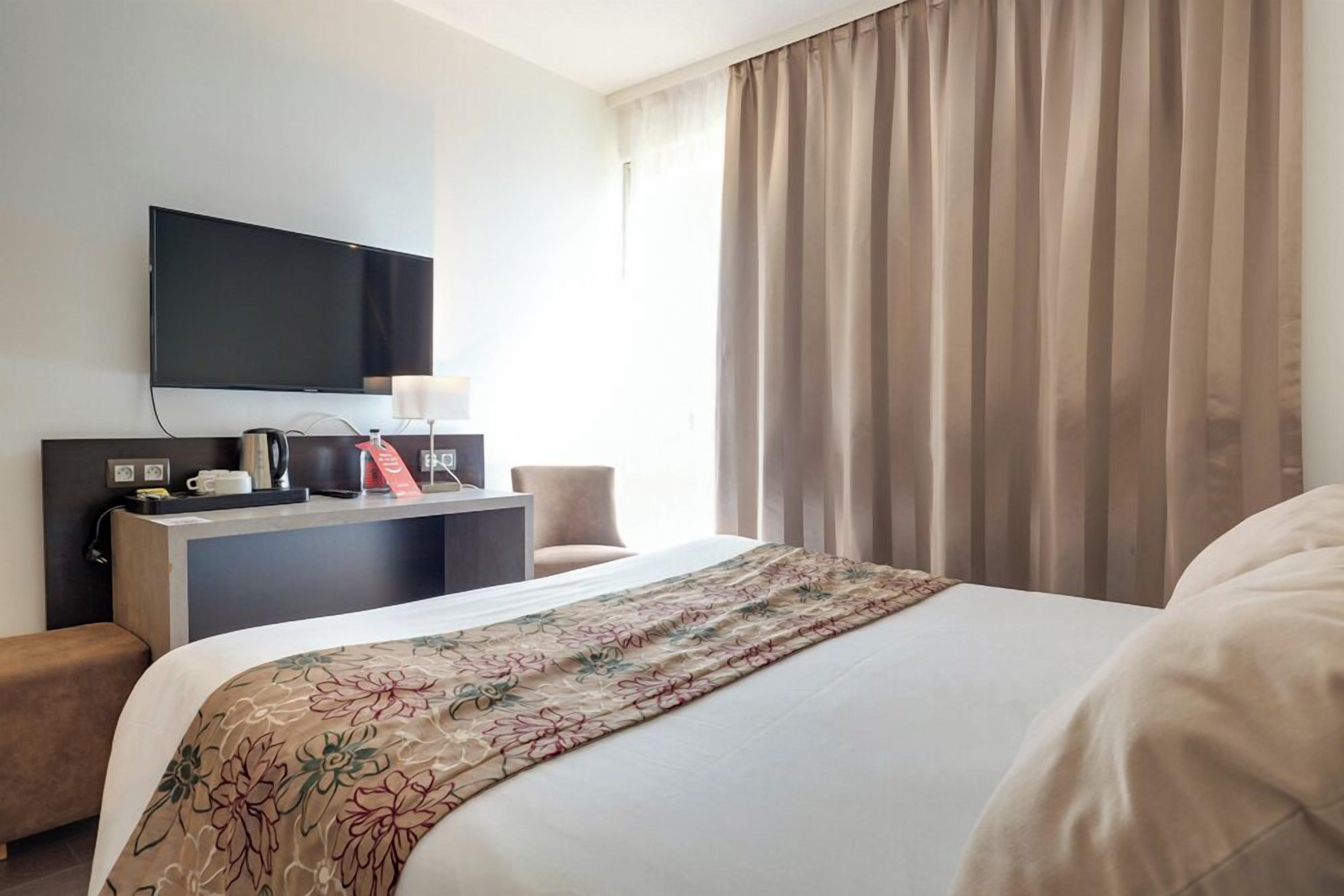 In-room safe, desk, blackout curtains, iron/ironing board