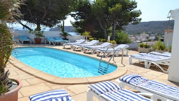 Outdoor pool, pool loungers