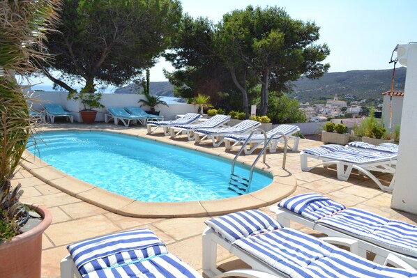 Outdoor pool, sun loungers