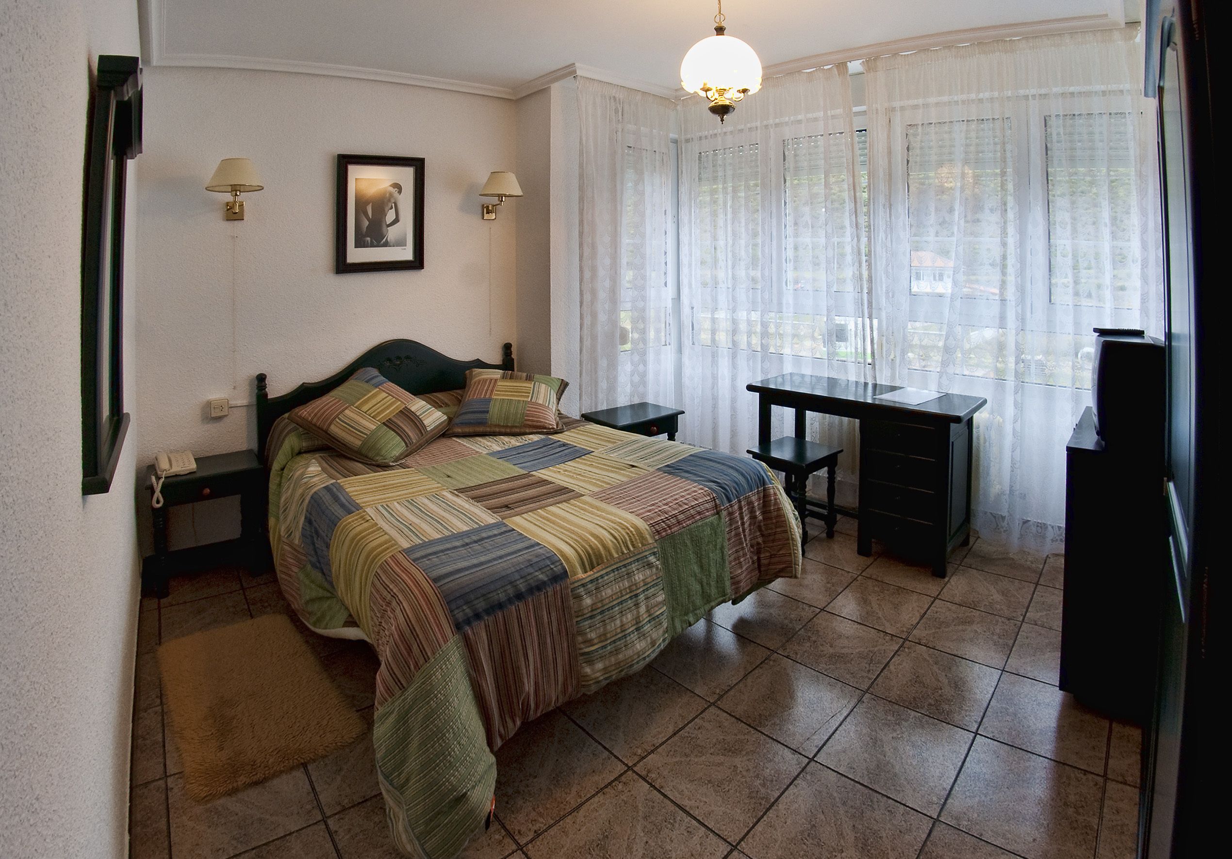 desk, blackout curtains, free wifi, bed sheets