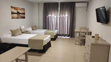 Studio, 2 Twin Beds | Desk, laptop workspace, free WiFi, bed sheets