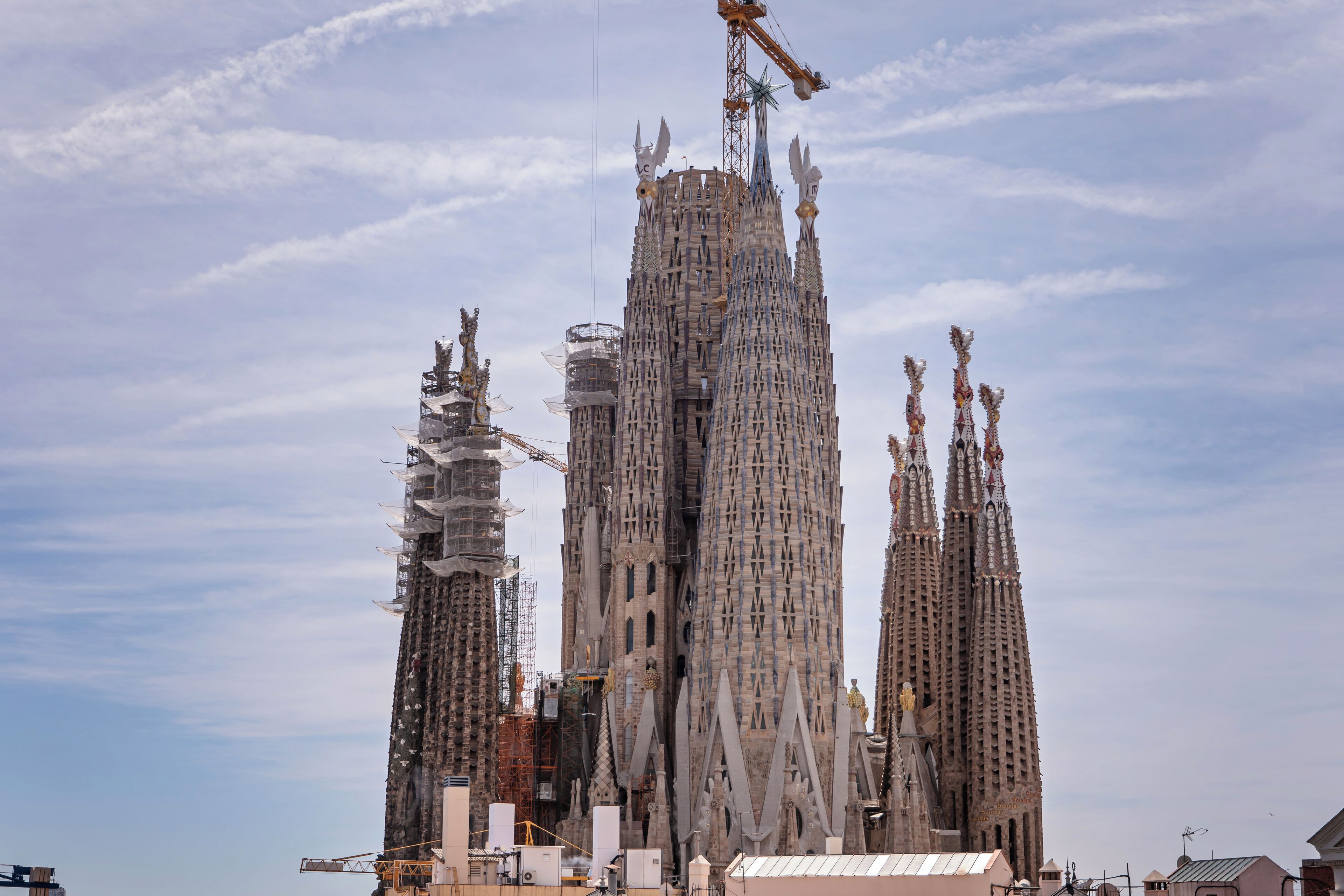 A large, ornate building with multiple spires and intricate architectural details.