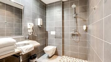 Quadruple Room (Suite for 4 per) | Bathroom | Hair dryer, towels