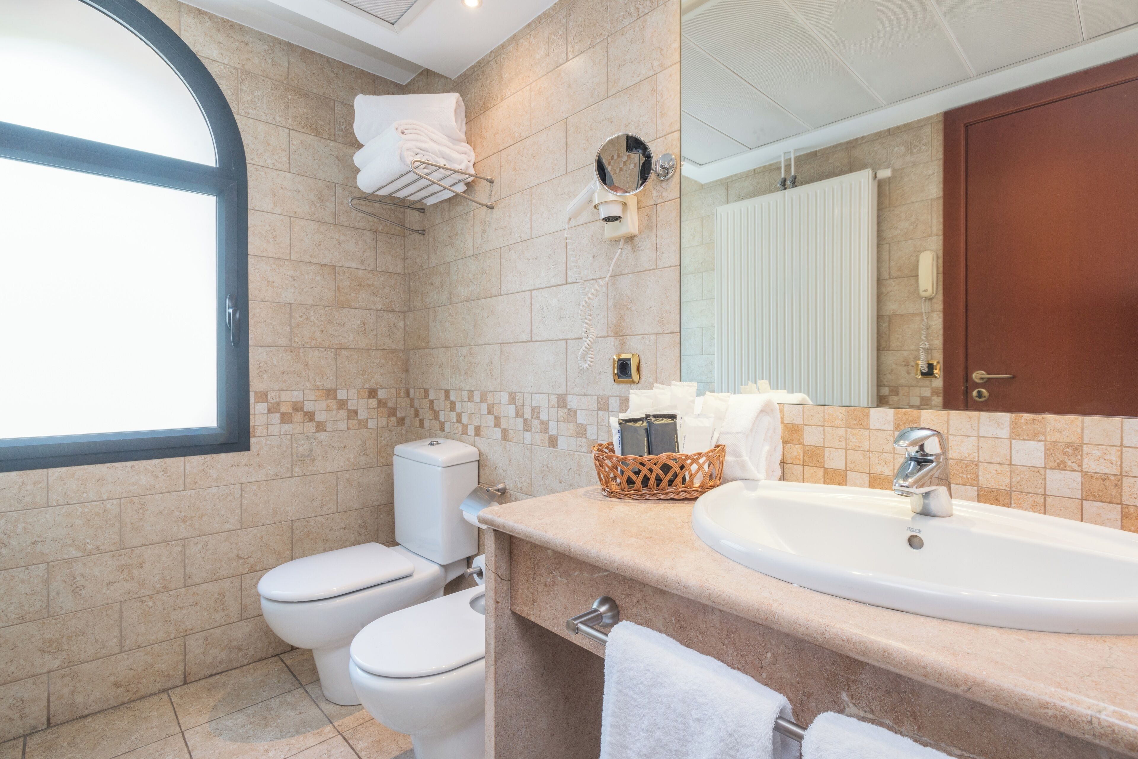 deluxe double room | bathroom | deep-soaking bathtub, free toiletries, hair dryer, bathrobes