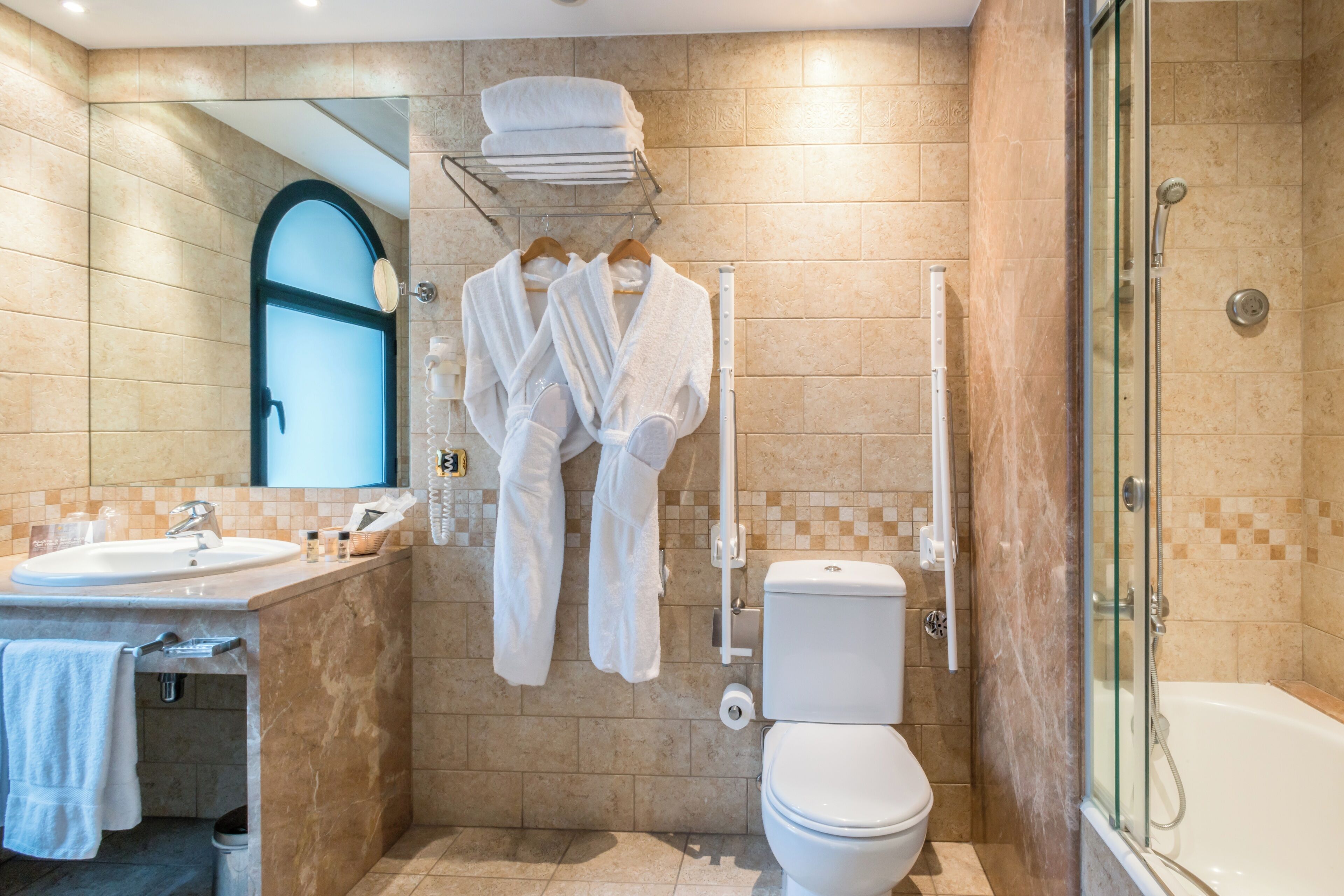 deep-soaking bathtub, free toiletries, hair dryer, bathrobes