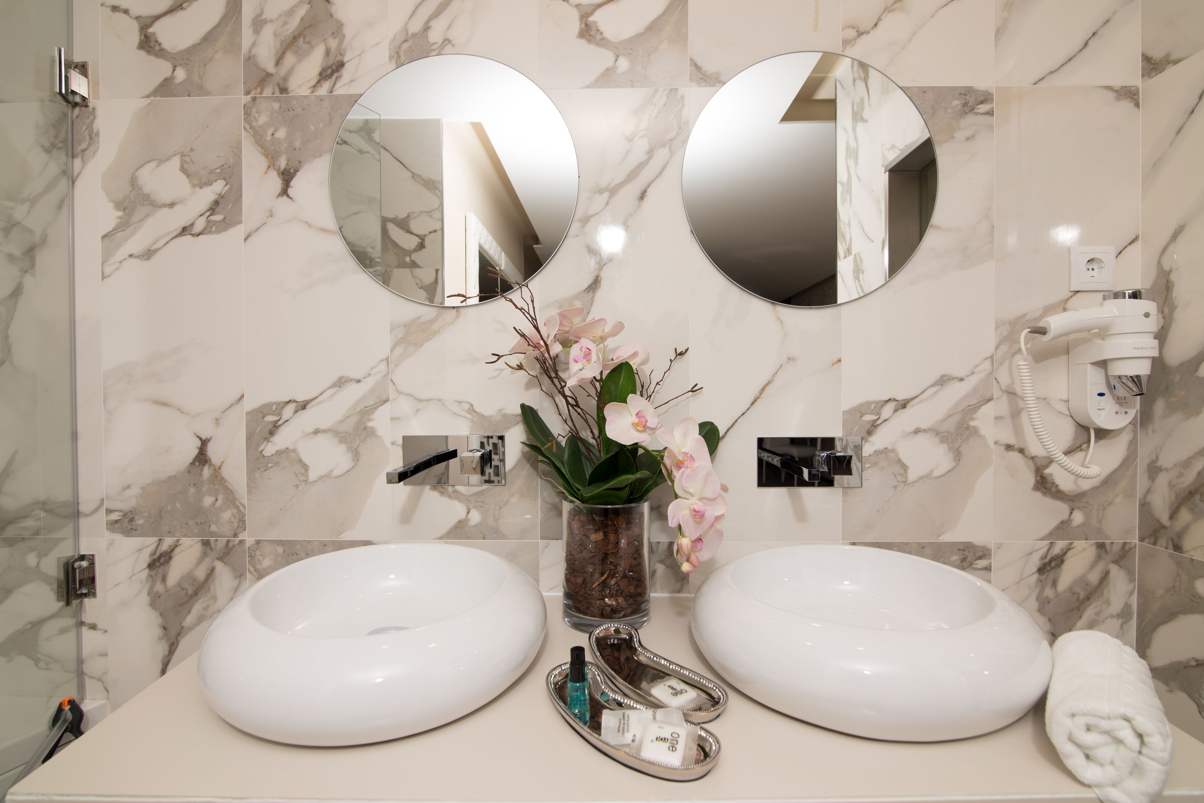 hair dryer, bidet, towels