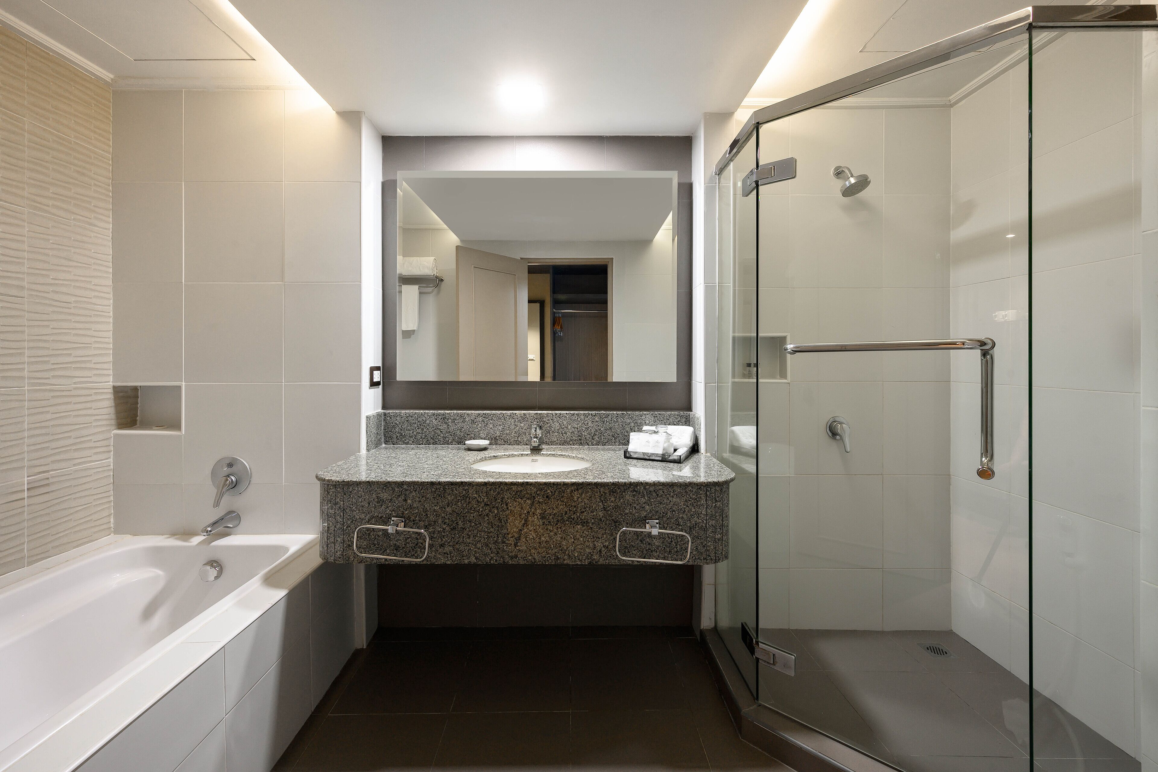 Separate bathtub and shower, free toiletries, hair dryer, bathrobes