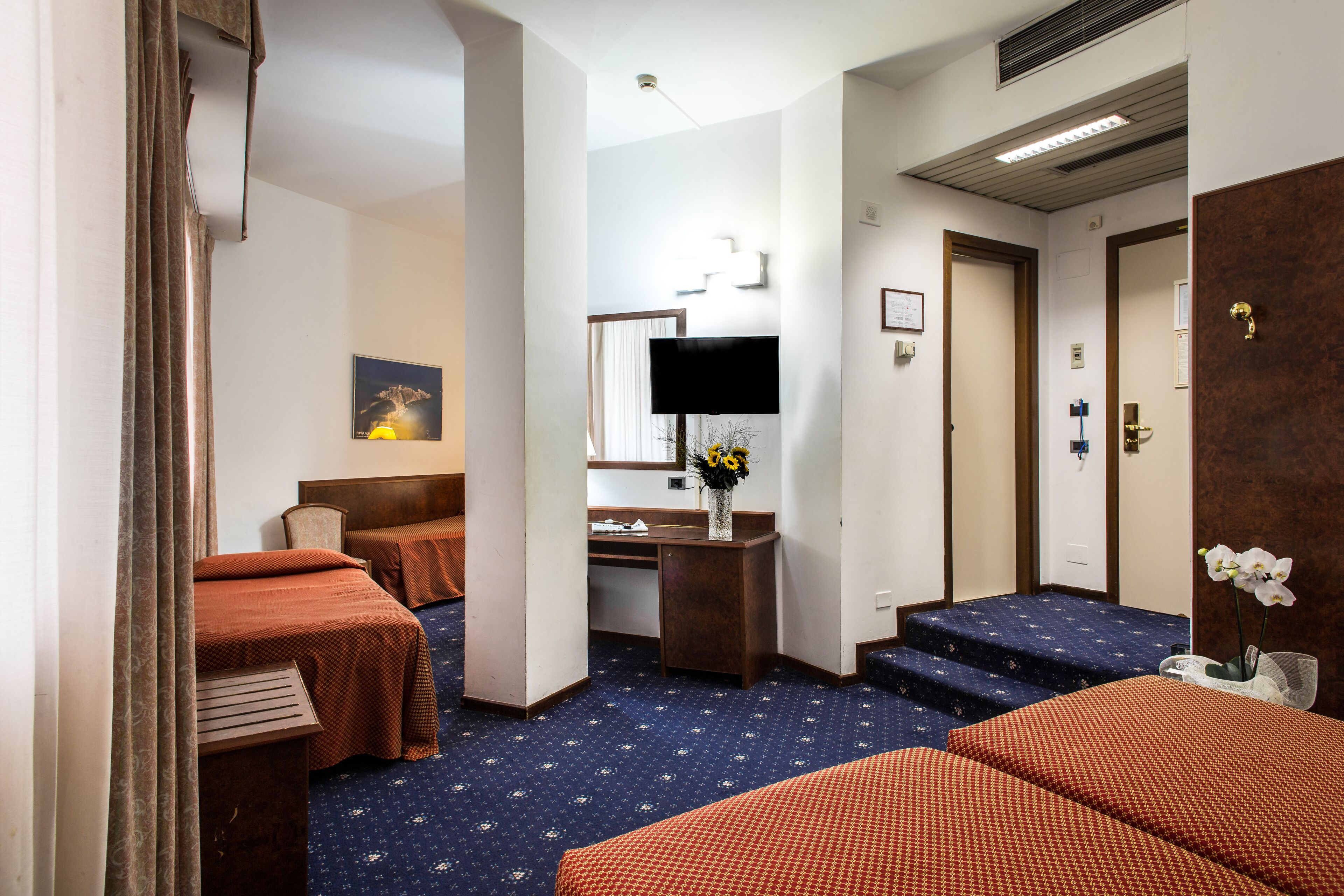 quadruple room | minibar, in-room safe, desk, laptop workspace