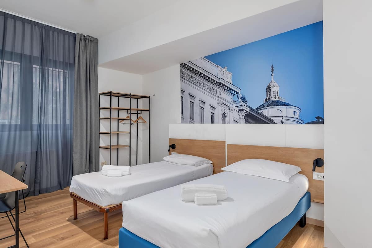 Economy Twin kamer | Donsdekens, een kluis op de kamer, gratis wifi, beddengoed