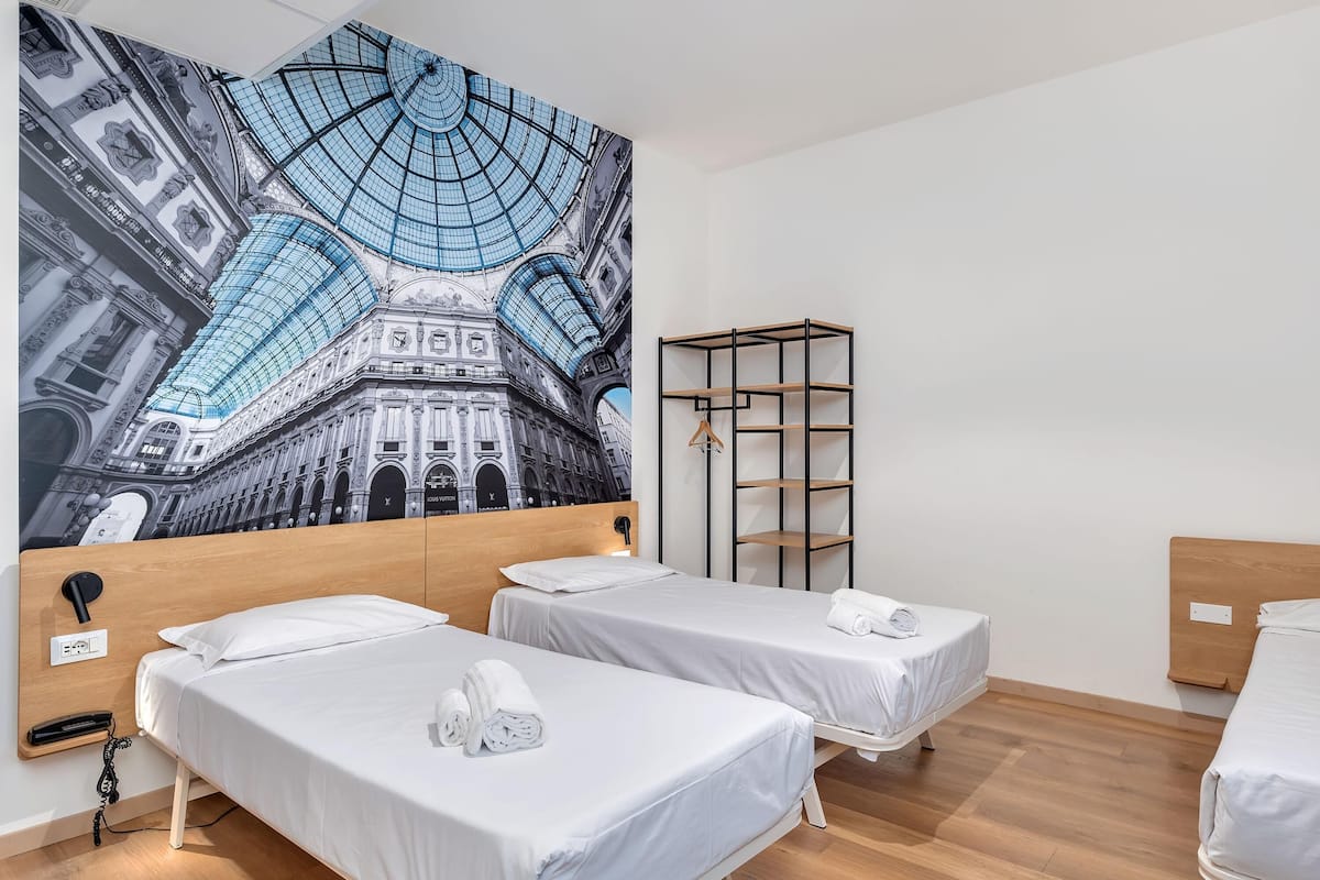 Economy Triple Room, Non Smoking | Down comforters, in-room safe, free WiFi, bed sheets