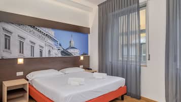 Cubrecamas, caja de seguridad en la habitación y wifi gratis