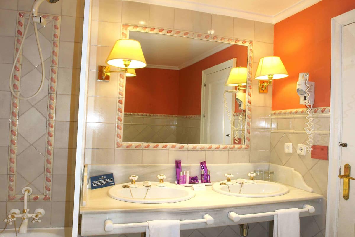 free toiletries, hair dryer, bathrobes, bidet