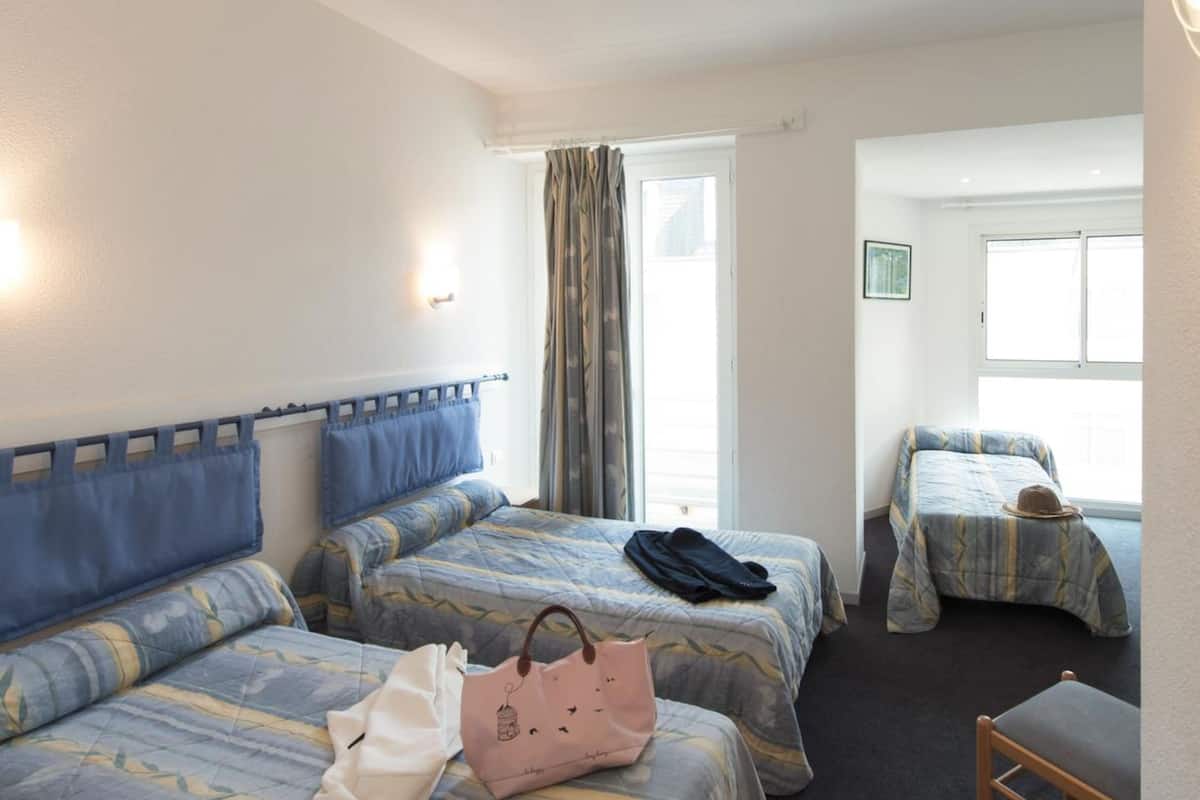 quadruple room | 1 bedroom, premium bedding, desk, blackout curtains