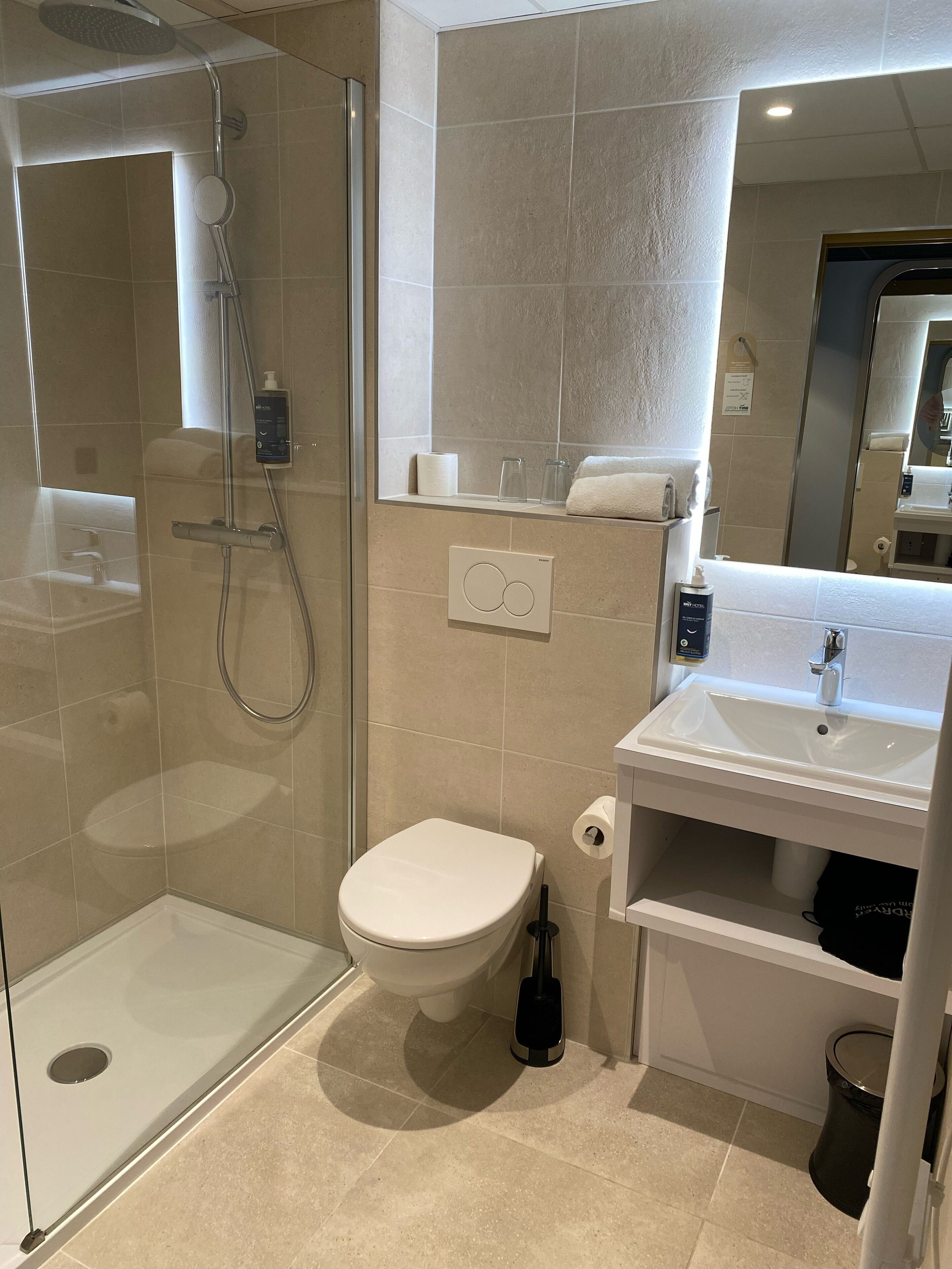 eco-friendly toiletries, hair dryer, towels, soap