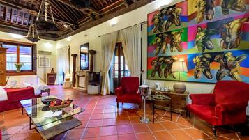 Suite, Balcony | Minibar, in-room safe, individually decorated, desk