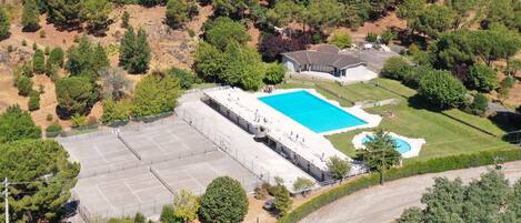 Indoor pool, seasonal outdoor pool, pool umbrellas, sun loungers